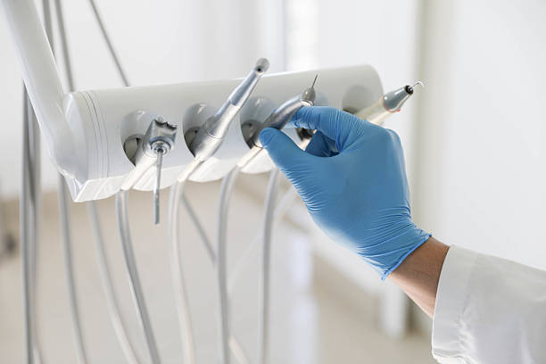 Professional Tooth Extraction technician working in DeLand, FL